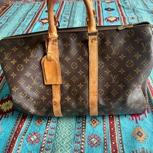 COPY - 100 % authentic Louise Vuitton travel, vintage bag.